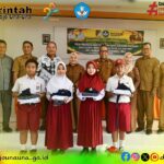 Wakil Bupati Surya Lapasiri Serahkan Bantuan Seragam Sekolah, Dukung Pemerataan Akses Pendidikan di Tojo Una-Una